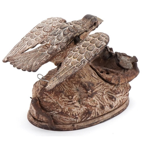 2323 - Cast iron trick bird moneybox, 18cm in length