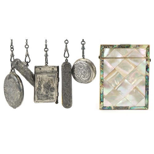 1241 - Early 20th century white metal chatelaine with attachments and a mother of pearl card case, the chat... 