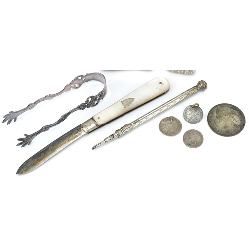 1271 - Silver and white metal objects including a pair of Norwegian sterling silver sugar tongs, two silver... 