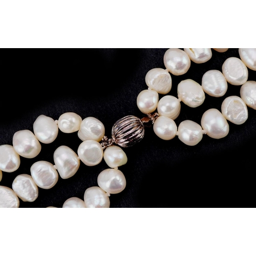 3545 - Freshwater pearl three row necklace with silver clasp, 44cm in length, 124.0g