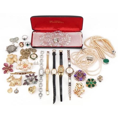 3543 - Vintage and later costume jewellery and wristwatches including jewelled brooches, simulated pearl ne... 