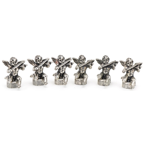 2203 - Set of six white metal place card holders in the form of Putti, 2.5cm high