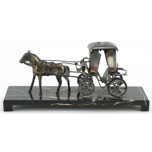 1242 - White metal study of a horse pulling a Hansom cab raised on black marble base, 20.5cm in length