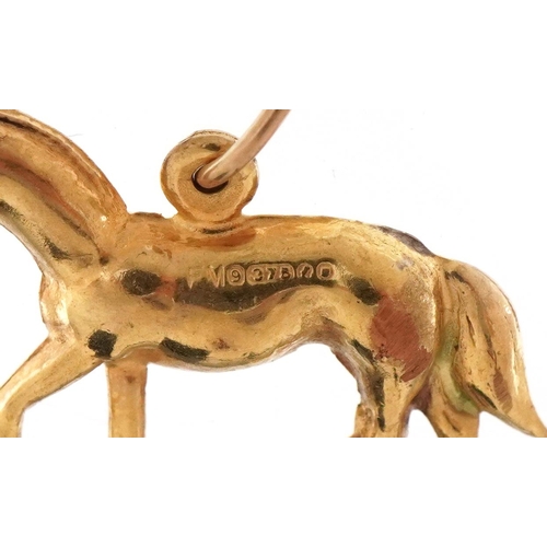 3235 - 9ct gold charm in the form of a horse, 2.1cm in length, 1.3g