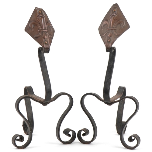 155 - Pair of Arts & Crafts copper and wrought iron Fleur de Lys design firedogs, 45cm high