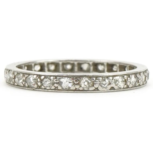 3047 - Unmarked white metal diamond eternity ring, size R, 3.8g