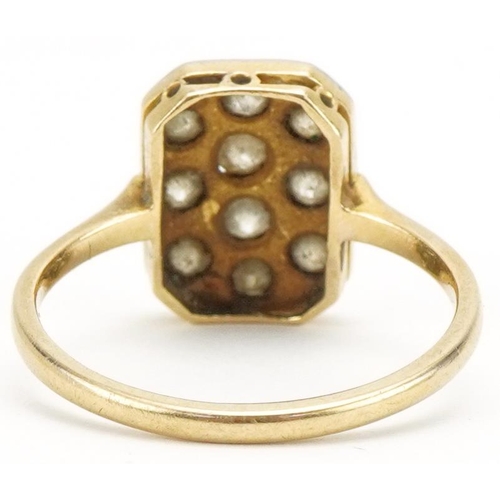 3026 - Art Deco 18ct gold and platinum diamond cluster ring housed in a Sanders Jewellers Ltd Bakelite box,... 