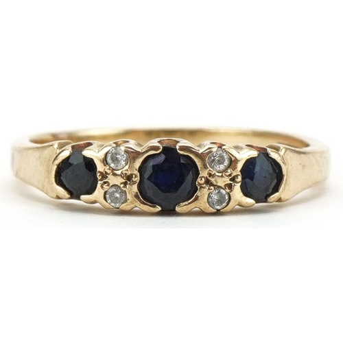 3348 - 9ct gold sapphire and clear stone ring set with seven stones, size L, 2.2g