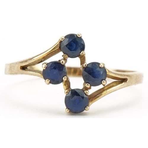 3201 - 9ct gold sapphire four stone ring, size M, 1.3g