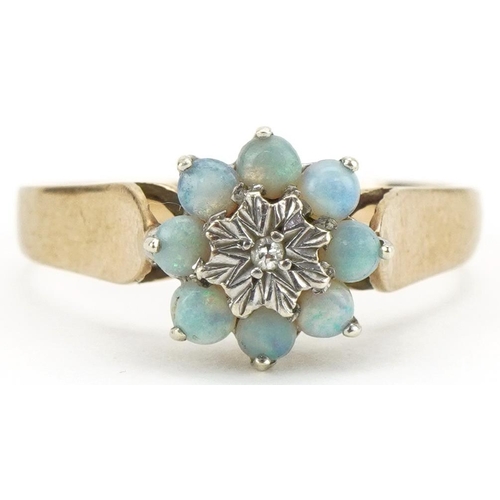 3393 - 9ct gold opal and diamond flower head ring, size R, 2.8g