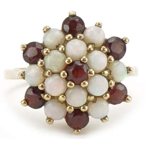 3324 - 9ct gold garnet and opal three tier cluster ring, size M/N, 4.2g