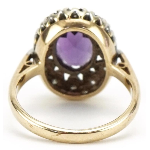 3095 - 9ct gold amethyst and diamond cluster ring, size I/J, 3.8g