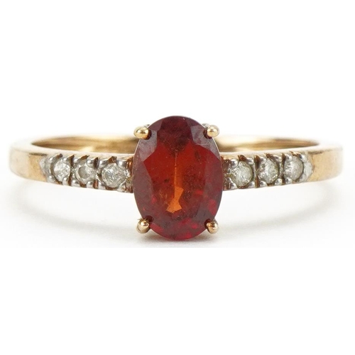 3318 - 9ct gold garnet solitaire ring with diamond set shoulders, size N, 1.5g