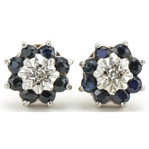 3042 - Pair of 9ct gold diamond and blue spinel flower head stud earrings, 9.2mm in diameter, total 2.2g