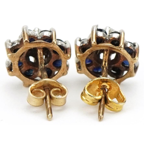 3042 - Pair of 9ct gold diamond and blue spinel flower head stud earrings, 9.2mm in diameter, total 2.2g