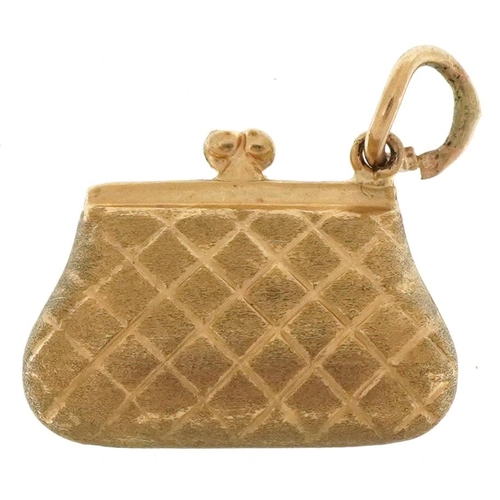 3230 - 9ct gold charm in the form of a clutch bag, 1.7cm wide, 1.0g