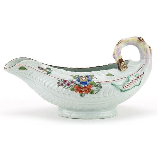 1038 - 18th century Worcester porcelain sauce boat hand painted with flowers, 19cm in length