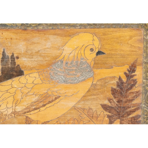 159A - Large Arts & Crafts wooden marquetry panel decorated with a pheasant in a landscape, framed by brass... 