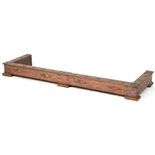 642 - Arts & Crafts stylized copper fire kerb, 134cm x 36cm