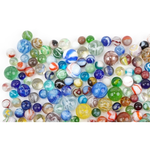 2315 - Collection of 19th century and later glass marbles, the largest 25mm in diameter