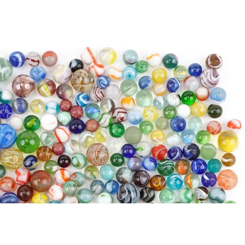 2315 - Collection of 19th century and later glass marbles, the largest 25mm in diameter