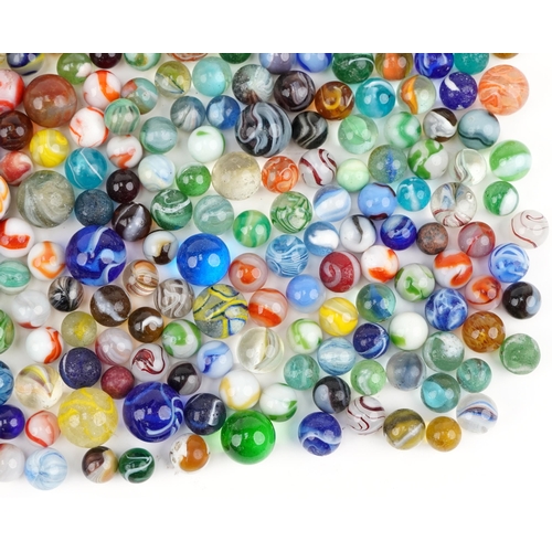 2315 - Collection of 19th century and later glass marbles, the largest 25mm in diameter