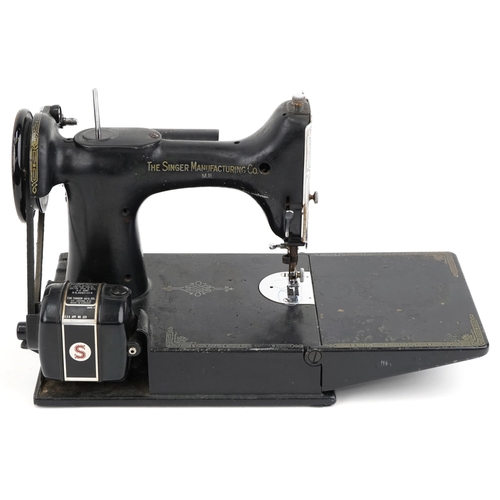 2304 - Vintage electric Singer sewing machine with case