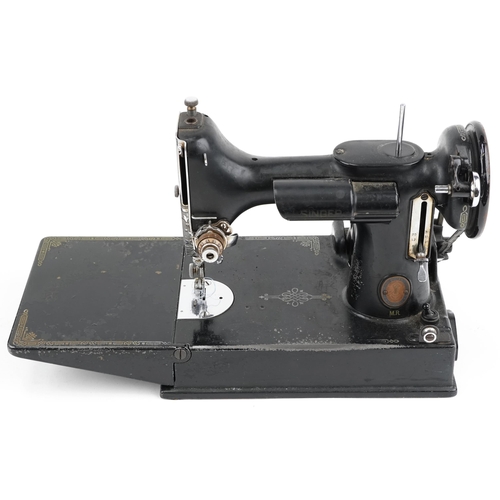 2304 - Vintage electric Singer sewing machine with case