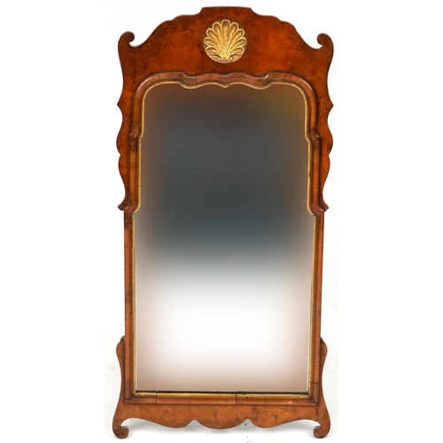 742 - Late 20th century Queen Anne style walnut fretwork wall mirror with inner gilt slip, 80cm x 40cm