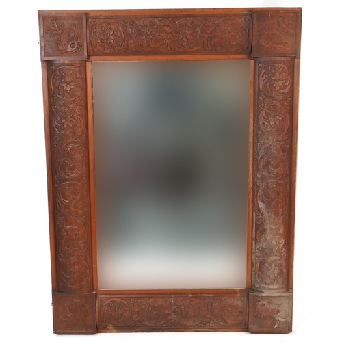 744 - Late 20th century French carved walnut overmantle mirror, 138cm x 105cm