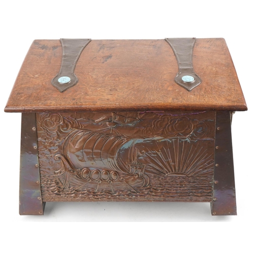 249 - Arts & Crafts oak and copper coal box decorated with a galleon in full sail, sunrise and inset with ... 