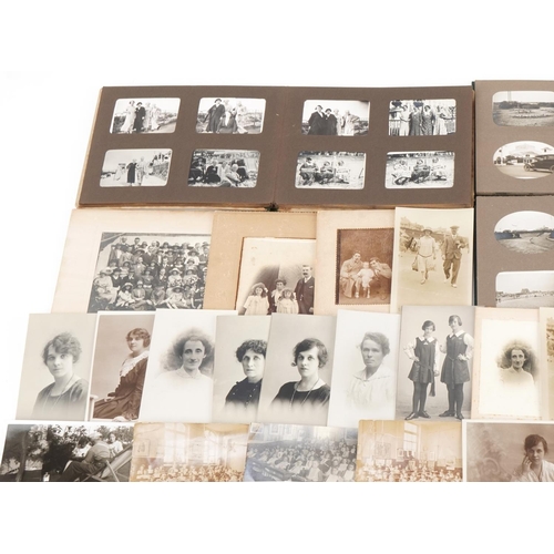 2466 - Black and white family photographs including cabinet cards, postcards of school classroom scenes and... 