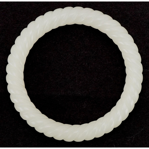 3355 - Chinese jade rope twist design bangle, 8.5cm in diameter, 48.0g