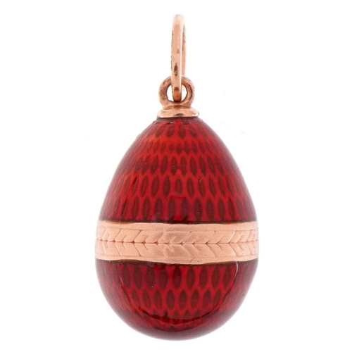 3233 - 14ct gold red guilloche enamel egg pendant, impressed Russian marks, 2.5cm high, 2.5g