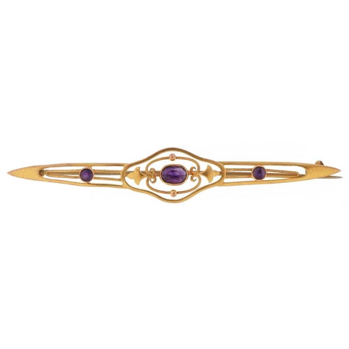 3212 - Edwardian unmarked gold amethyst openwork bar brooch, 7.5cm wide, 3.1g