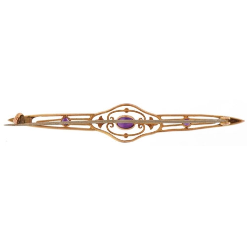 3212 - Edwardian unmarked gold amethyst openwork bar brooch, 7.5cm wide, 3.1g