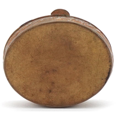 2222 - Gilt metal and enamel pill box with mirrored interior, 4.2cm wide