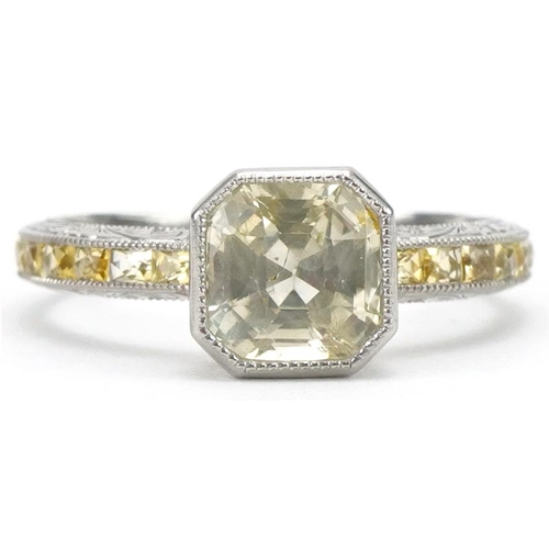 3354 - Art Deco style platinum ring with certificate, set with an octagonal Sri Lankan yellow sapphire and ... 