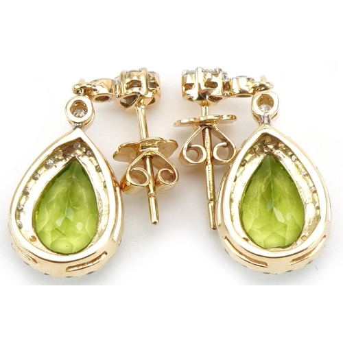 3322 - Pair of 18ct gold peridot and diamond teardrop earrings, total diamond weight approximately 0.90 car... 