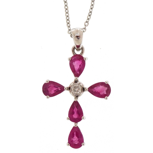 3370 - 9ct white gold ruby and diamond cross pendant on a silver necklace, total diamond weight approximate... 