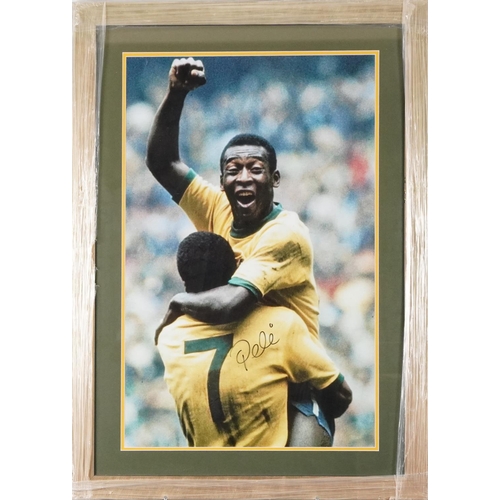 1398 - Football interest photograph of Pele with signature, mounted framed and glazed, 60x 39cms, (Collecte... 