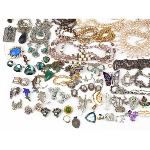 3568 - Large collection of jewellery including jewelled and enamel brooches, simulated pearl necklaces, sem... 