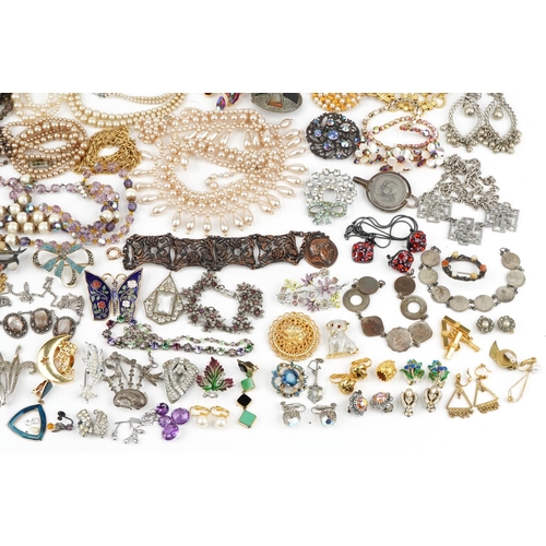 3568 - Large collection of jewellery including jewelled and enamel brooches, simulated pearl necklaces, sem... 