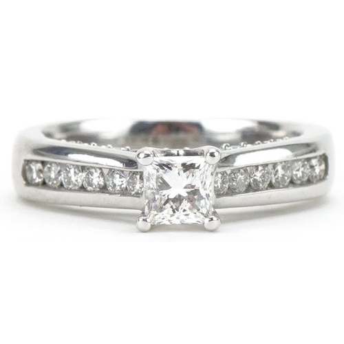 3307 - 14ct white gold princess cut diamond solitaire ring with diamond set shoulders and bridge, with cert... 