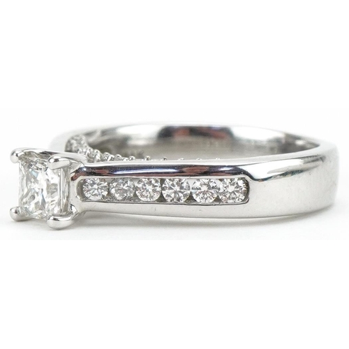 3307 - 14ct white gold princess cut diamond solitaire ring with diamond set shoulders and bridge, with cert... 