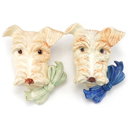 426 - Two Beswick Sealyham terrier dog wall plaques, each 20cms high