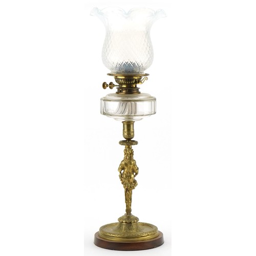 1012 - Victorian brass maiden oil lamp with clear glass reservoir and Vaseline glass shade, 64cm high