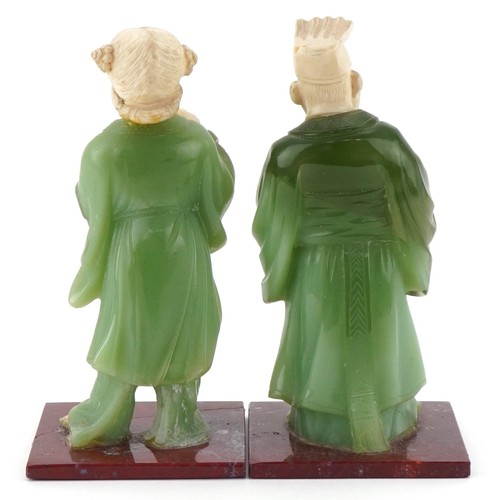 1300 - Pair of Vintage Chinese resin figures of a lady and gentleman, 15cm high