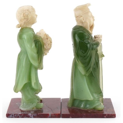 1300 - Pair of Vintage Chinese resin figures of a lady and gentleman, 15cm high