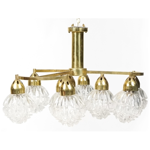 752 - Vintage brass chandelier with nine globular glass shades, 55cm in diameter